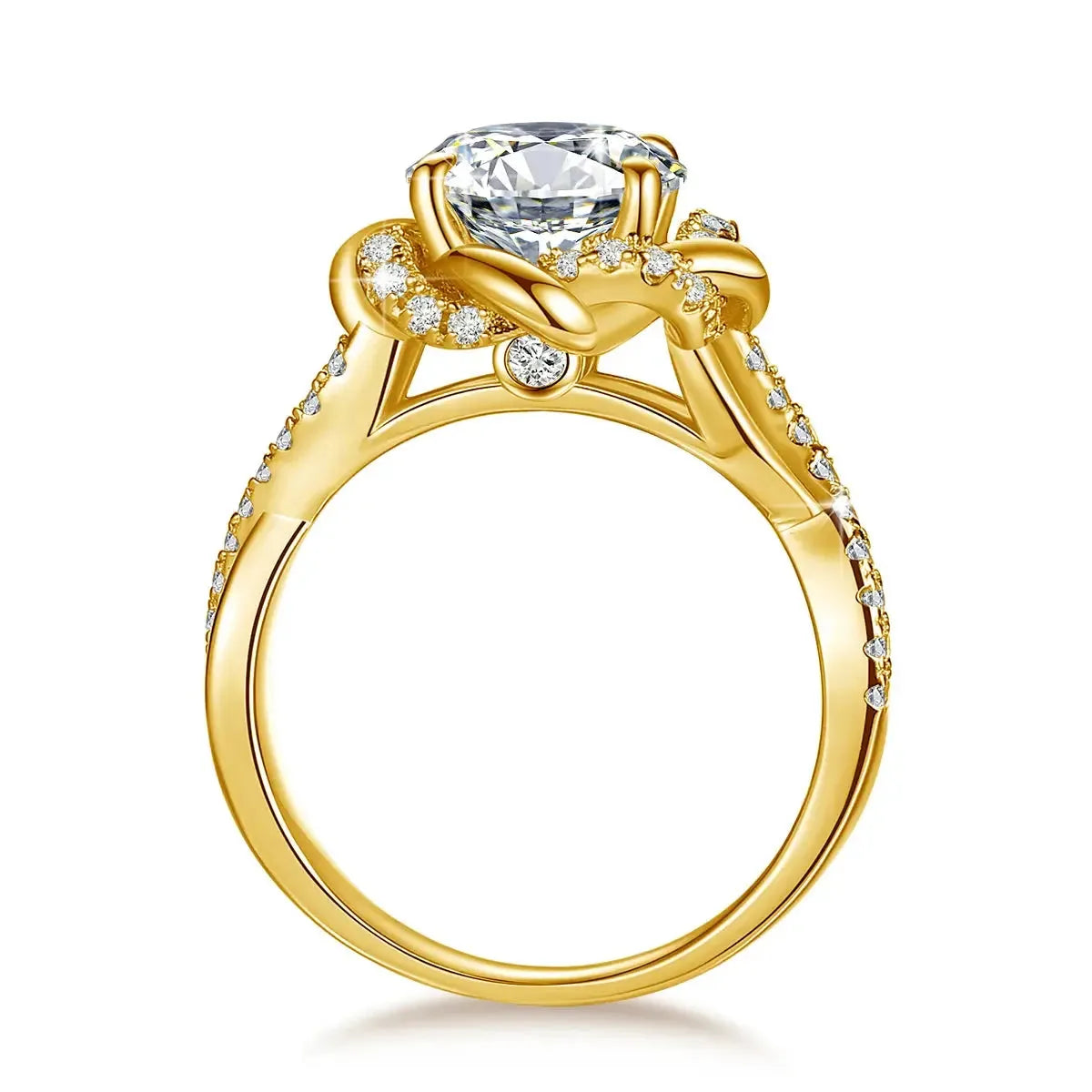 A gold engagement ring with a large central diamond. The band features intricate detailing with smaller diamonds encrusted along the sides and a unique twisted design around the main stone.