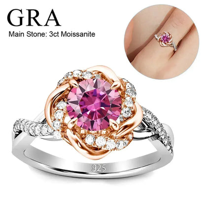 A rose gold and silver ring with a pink gemstone.